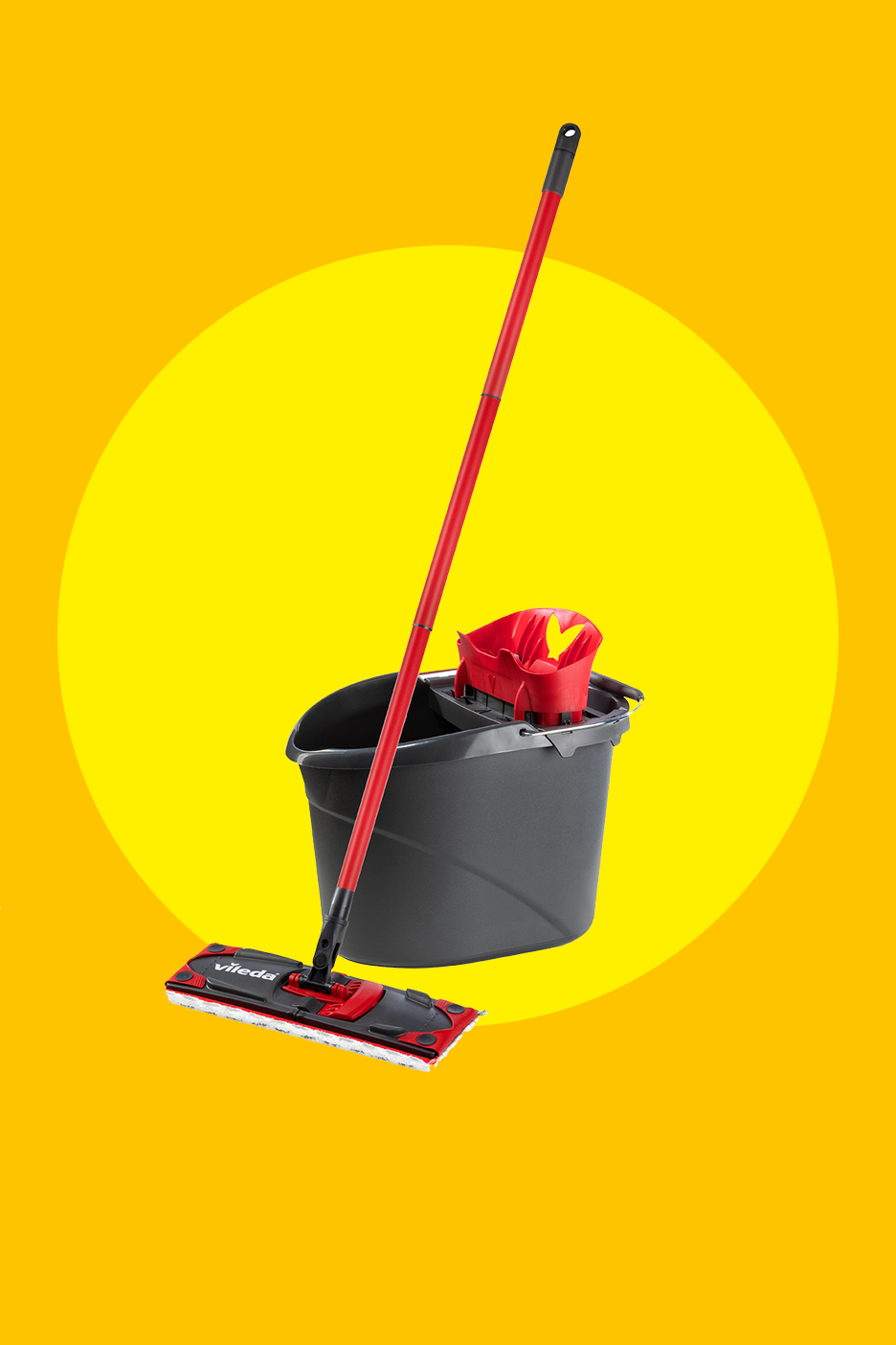 Punane mopp ja hall ämber kollasel taustal