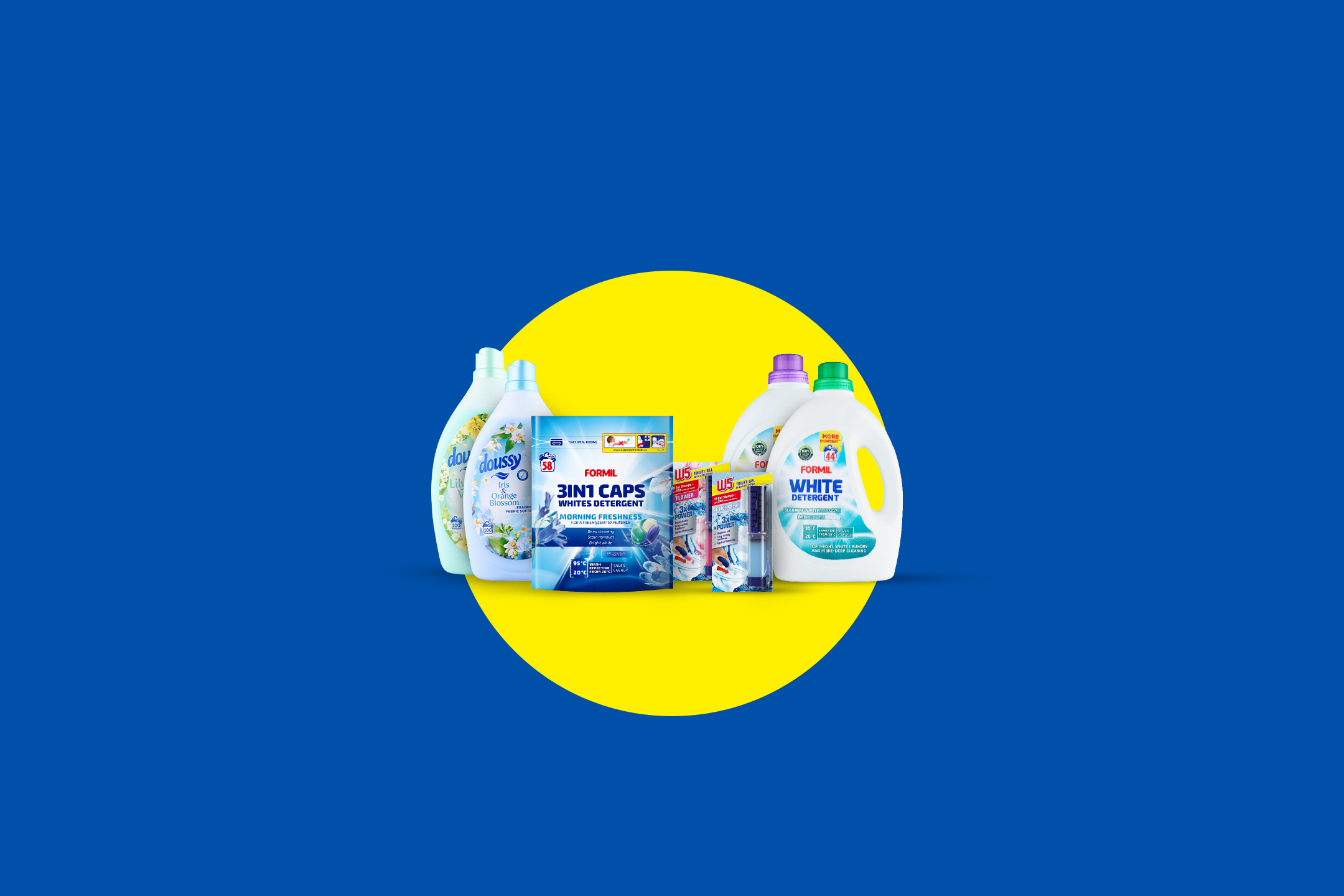 Erinevad pesuvahendid ja pesupehmendajad sinisel taustal kollase ringiga.