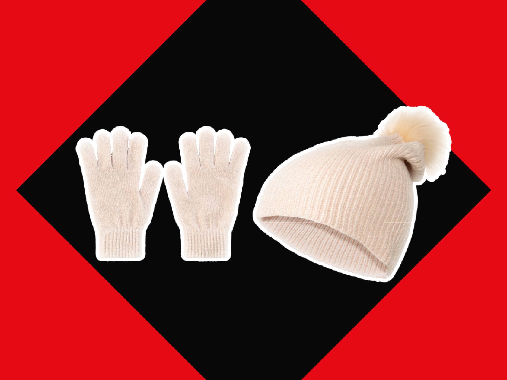 Белые перчатки и шапка с помпоном на черно-красном фоне